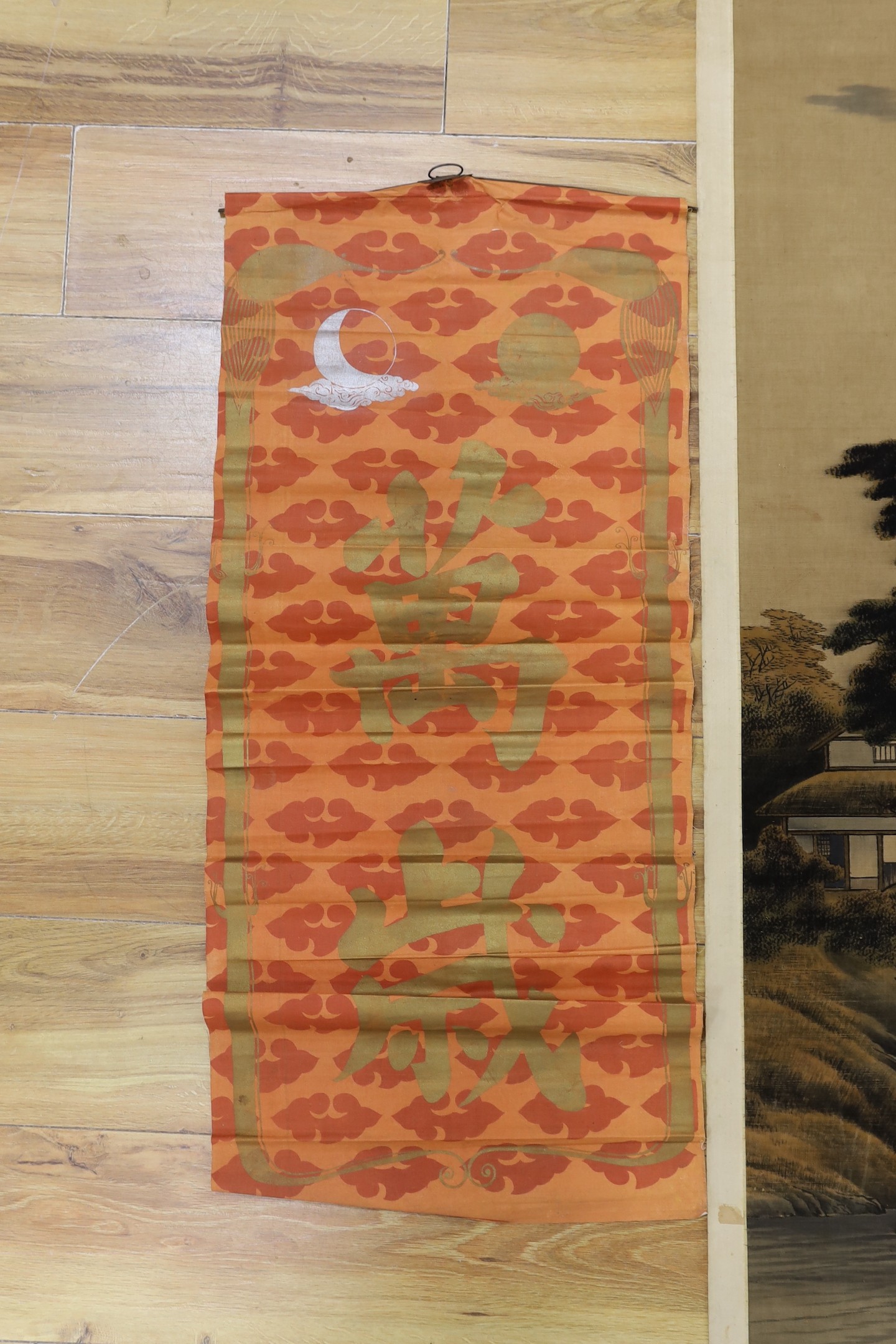 A Chinese calligraphic fabric hanging, 90 x 37cm, together with an early 20th century Japanese painted felt and watercolour landscape scroll